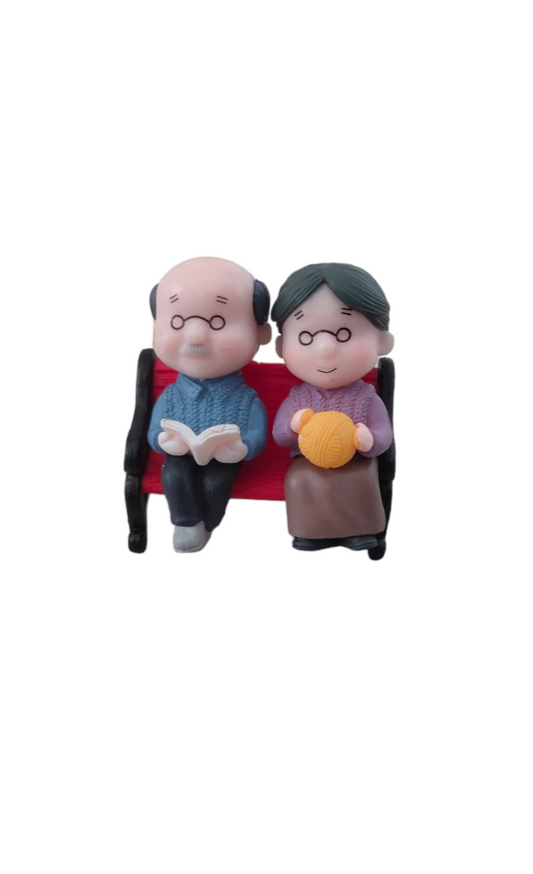 Grand Parents Sitting on Bench